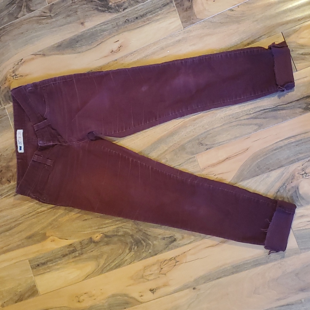 Maroon Levi's Demi Curve corduroy pants.